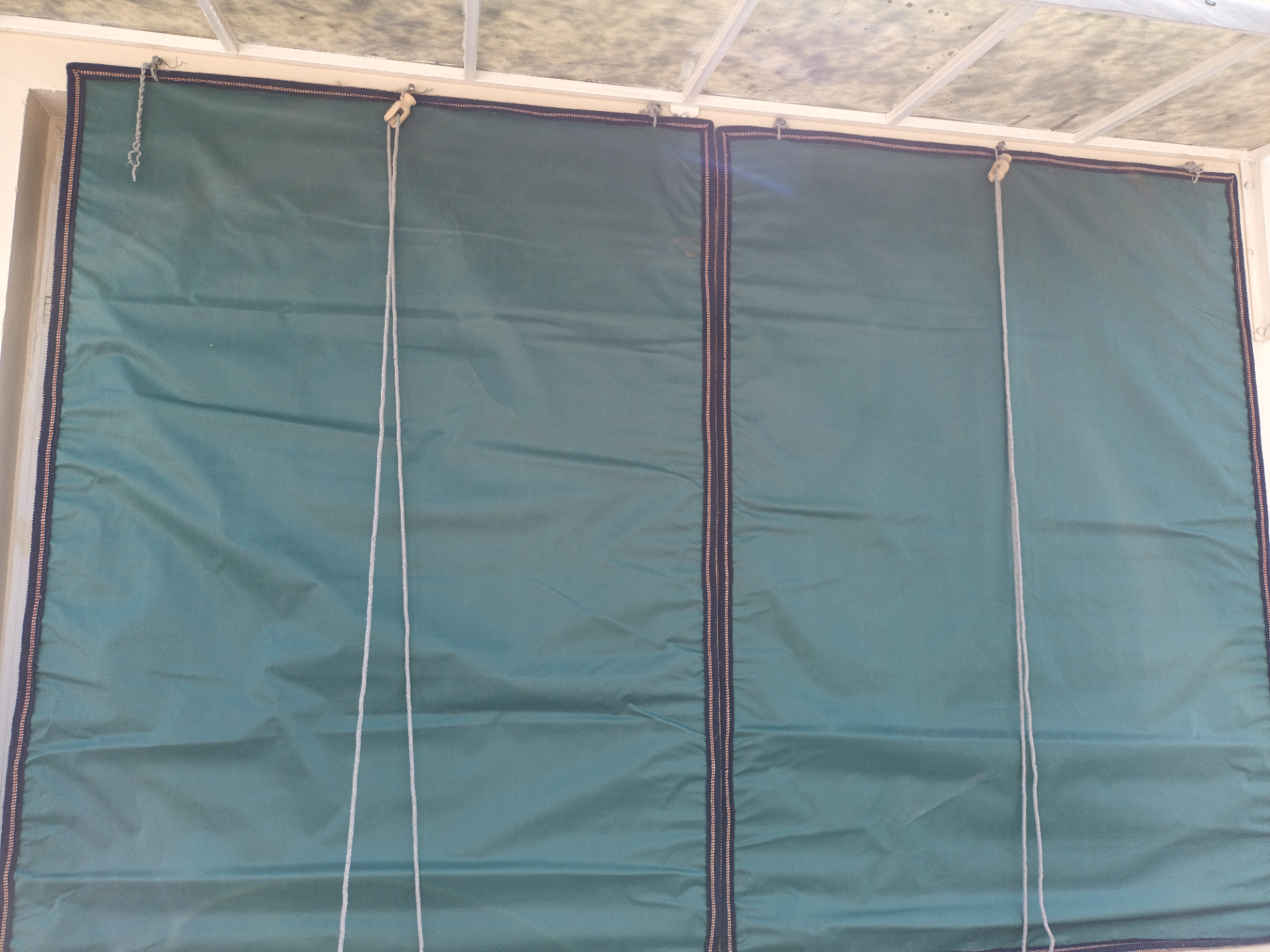 Bamboo chick blinds fitted to a balcony
