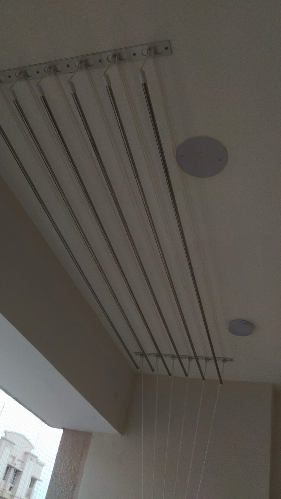Ceiling mounted cloth hanger with 6-rod configuration