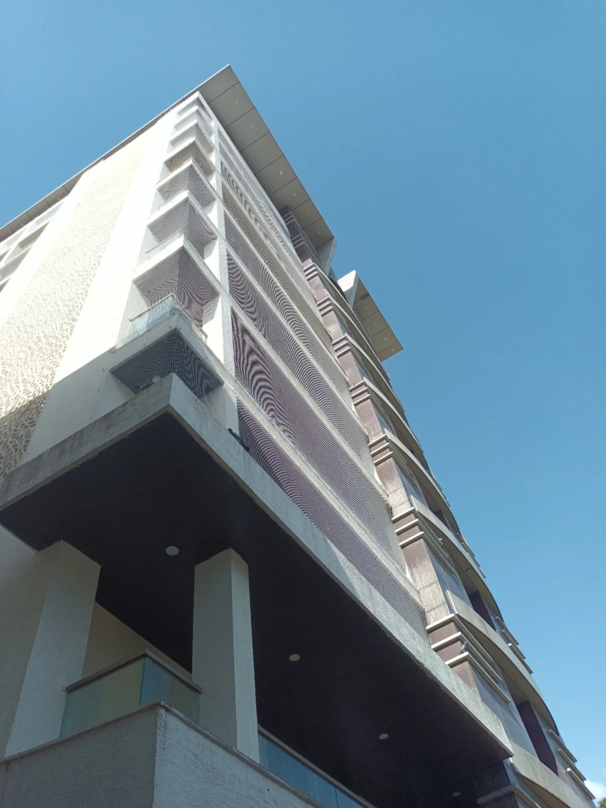 Pigeon net installed across multiple apartment balconies