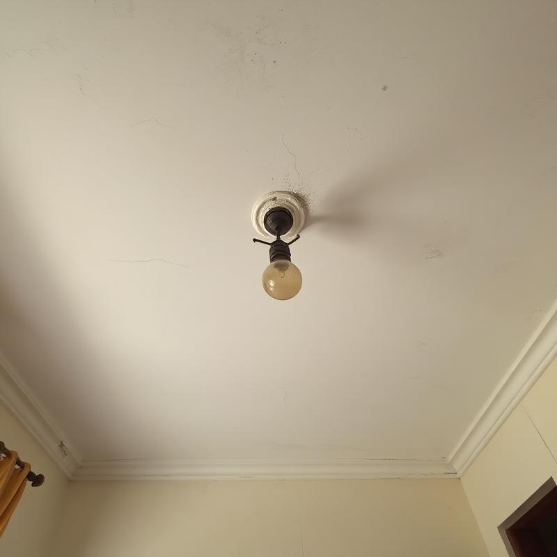 Plain flat ceiling before POP false ceiling installation